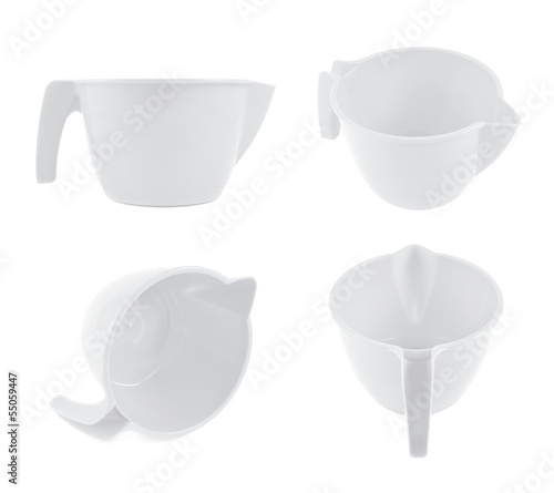 Photo: Plastic measuring cup isolated Plastic measuring cup isolated