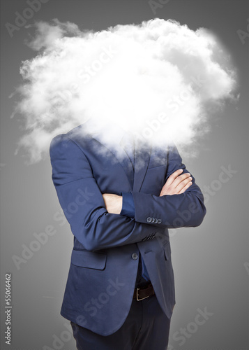 Photo: Businessman with head in the clouds Businessman with head in the clouds
