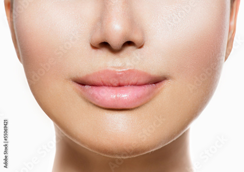Photo: Beautiful Perfect Lips. Sexy Mouth Closeup over white Beautiful Perfect Lips. Sexy Mouth Closeup over white