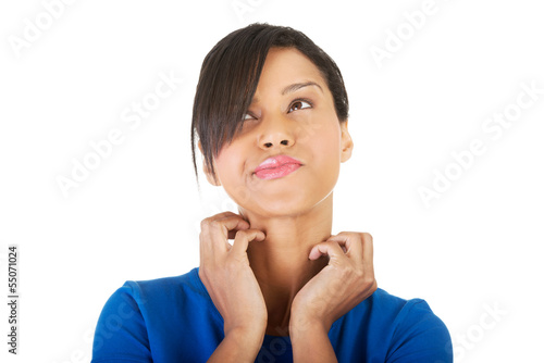 Photo: Young beautiful woman scratching her self. Young beautiful woman scratching her self.