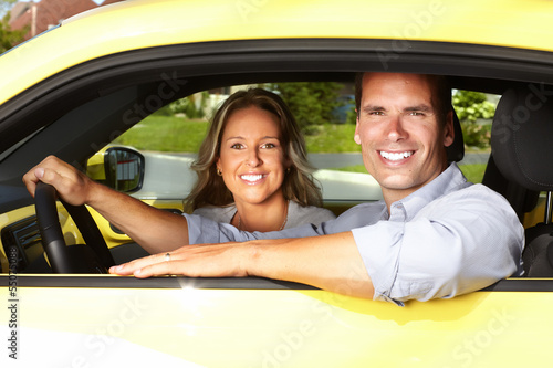 Photo: Couple in the car. Couple in the car.