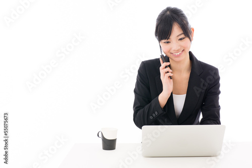 Photo: asian businesswoman working on white background asian businesswoman working on white background