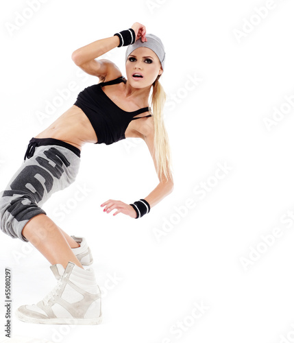 Photo: modern style dancer posing on studio background modern style dancer posing on studio background