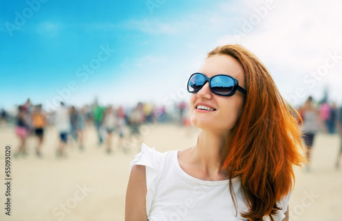 Photo: Woman at a beach party Woman at a beach party