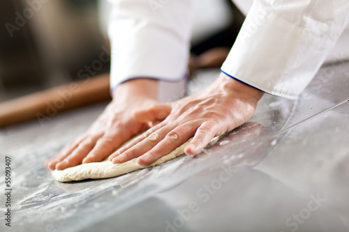 Photo: Chef prepairing dough Chef prepairing dough