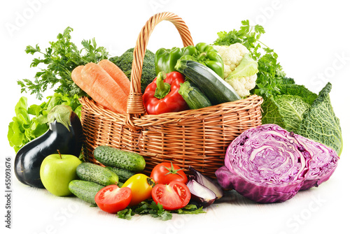 Photo: Variety of fresh organic vegetables isolated on white Variety of fresh organic vegetables isolated on white