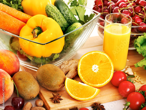 Photo: Fresh vegetable on wooden boards. Fresh vegetable on wooden boards.
