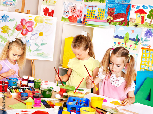 Photo: Children painting at school. Children painting at school.
