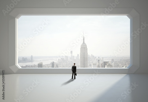 Photo: businessman and big window businessman and big window