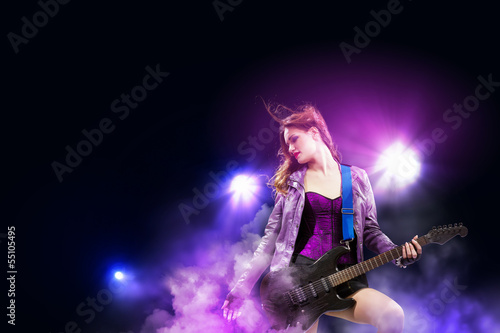 Photo: Rock passionate girl with black wings Rock passionate girl with black wings