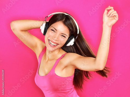 Photo: Music - woman wearing headphones dancing Music - woman wearing headphones dancing