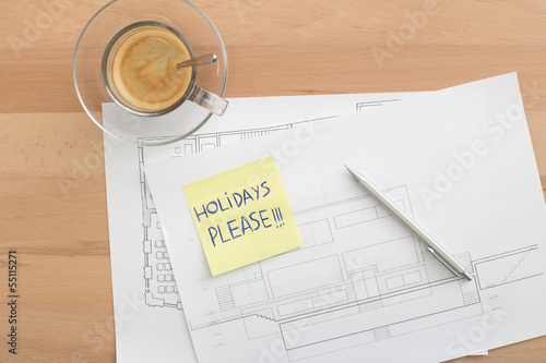 Photo: Holidays please written on a post-it Holidays please written on a post-it