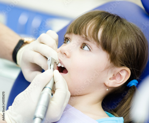 Photo: close-up medical dentist procedure of teeth polishing with clean close-up medical dentist procedure of teeth polishing with clean