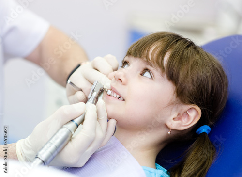Photo: close-up medical dentist procedure of teeth polishing with clean close-up medical dentist procedure of teeth polishing with clean