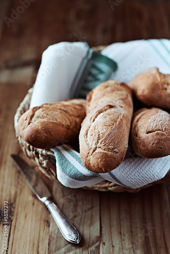 Photo: Close up of baguettes in a basket Close up of baguettes in a basket