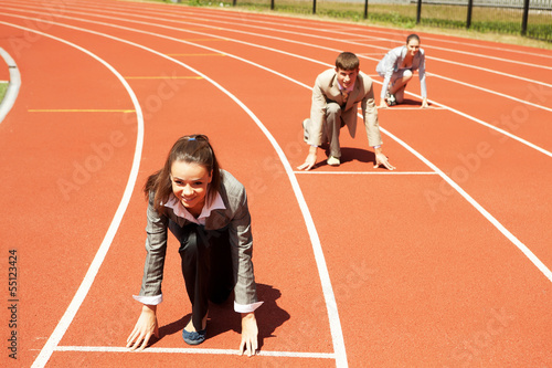 Photo: Business woman at athletic stadium Business woman at athletic stadium