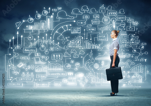 Photo: Business woman and business project Business woman and business project