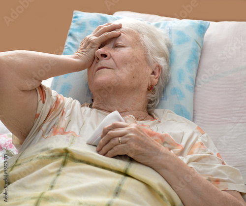 Photo: Senior woman lying at bed Senior woman lying at bed