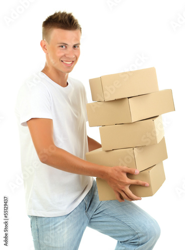 Photo: Young delivery man holding parcels, isolated on white Young delivery man holding parcels, isolated on white
