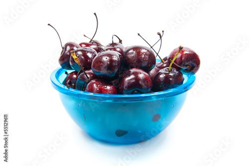 Photo: Fresh cherries in bowl isolated on white Fresh cherries in bowl isolated on white