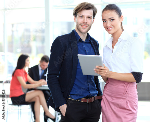 Photo: Image of two business partners planning work Image of two business partners planning work