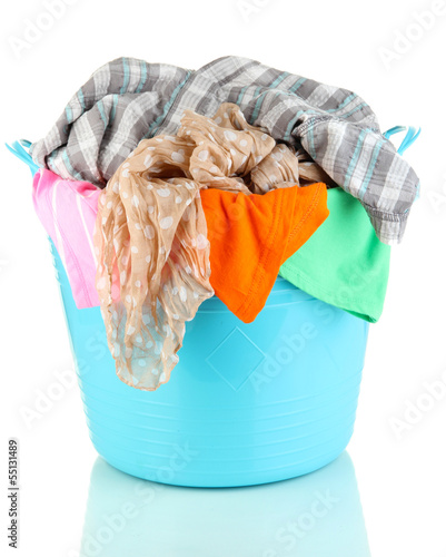 Photo: Blue laundry basket isolated on white Blue laundry basket isolated on white