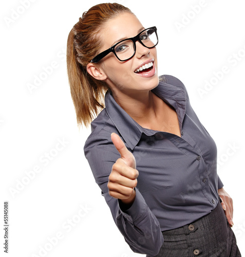 Photo: Happy smiling business woman with thumbs up gesture Happy smiling business woman with thumbs up gesture