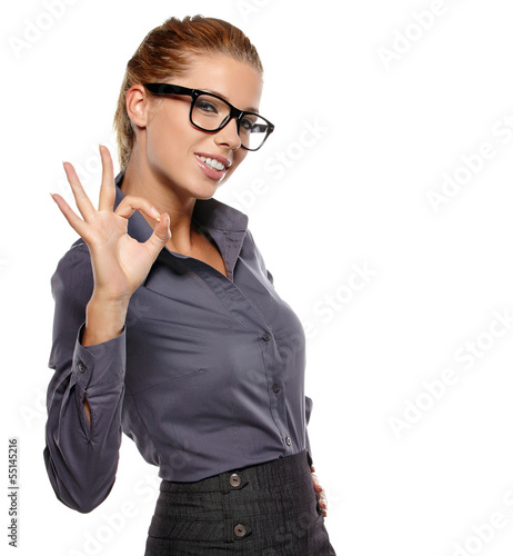Photo: Happy smiling business woman with thumbs up gesture Happy smiling business woman with thumbs up gesture