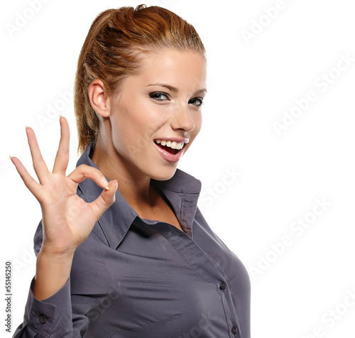Photo: Happy smiling business woman with thumbs up gesture Happy smiling business woman with thumbs up gesture