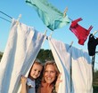 young girl hanging linen young girl hanging linen