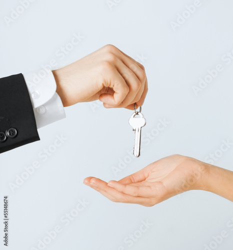 Photo: man and woman with house keys man and woman with house keys