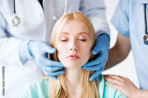 Photo: plastic surgeon or doctor with patient plastic surgeon or doctor with patient