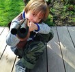 boy playing with gun boy playing with gun