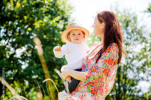 Photo: happy late summer mother with child happy late summer mother with child