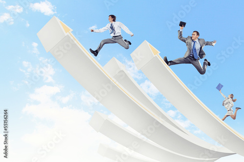 Photo: Businesspeople jumping Businesspeople jumping