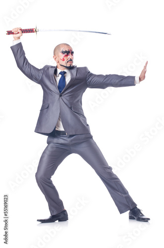 Photo: Businessman with sword isolated on white Businessman with sword isolated on white