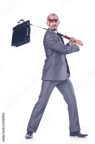 Photo: Businessman with sword isolated on white Businessman with sword isolated on white