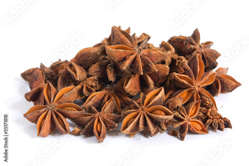 Photo: A pile of anise on white background A pile of anise on white background