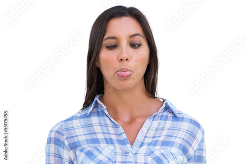 Photo: Young woman with tongue out Young woman with tongue out
