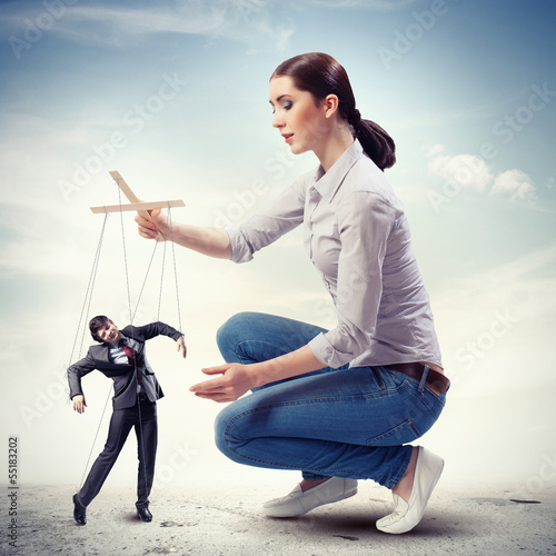 Photo: Businesswoman puppeteer Businesswoman puppeteer