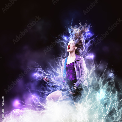 Photo: Rock passionate girl with black wings Rock passionate girl with black wings