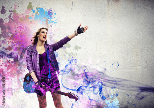 Photo: Rock passionate girl with black wings Rock passionate girl with black wings