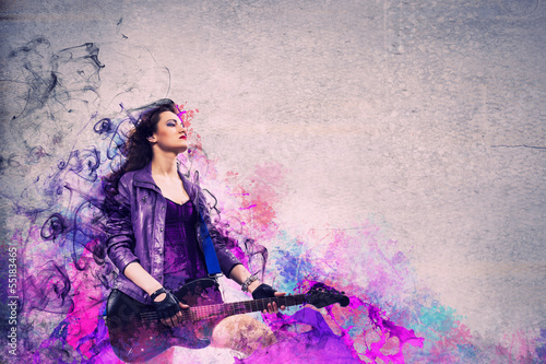 Photo: Rock passionate girl with black wings Rock passionate girl with black wings
