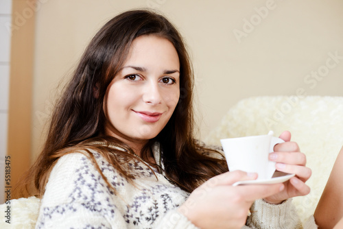 Photo: brunette with cup of coffee brunette with cup of coffee