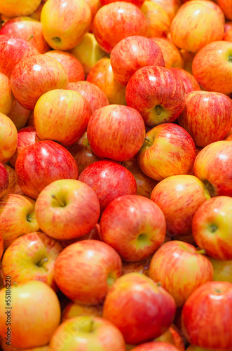 Photo: Lots of bright apples in supermarket Lots of bright apples in supermarket