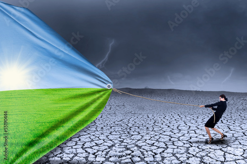 Photo: Businesswoman change dry season to spring Businesswoman change dry season to spring