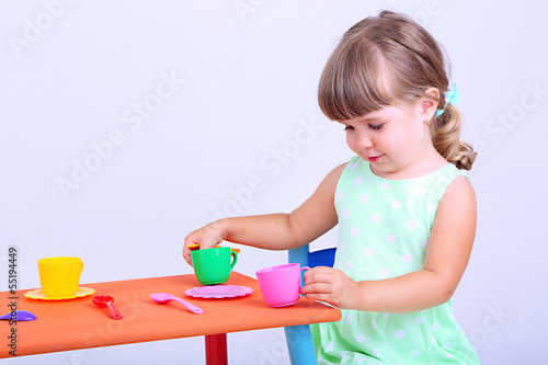 Photo: Little cute girl sitting Little cute girl sitting