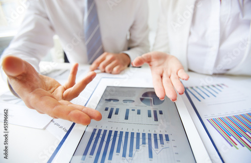 Photo: Discussing business data Discussing business data