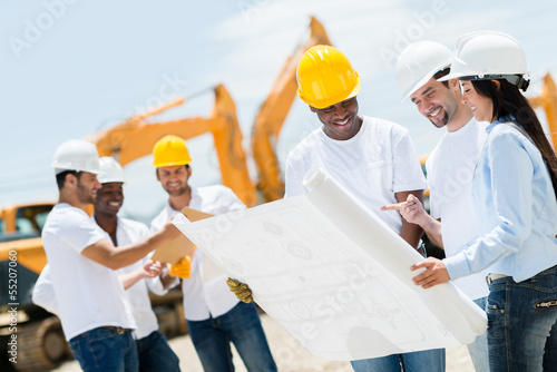 Photo: Architects at a construction site Architects at a construction site
