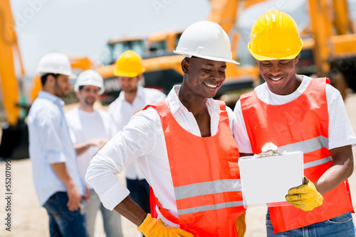 Photo: Workers at a building site Workers at a building site